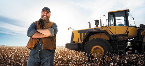 Man and tractor in field